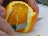 peler l'orange à vif